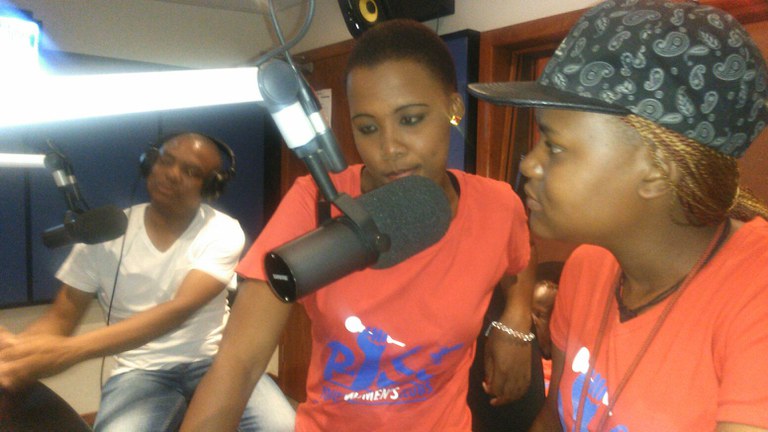 Mpho Mogapi with 2 RYWC members doing a GBV radio interview