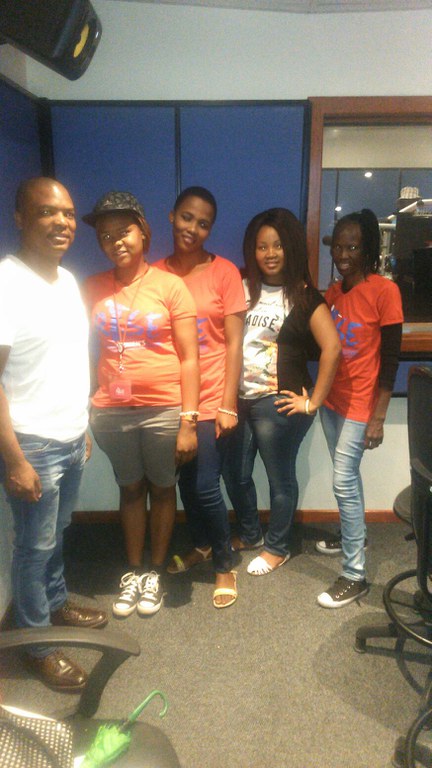 Mpho Mogapi with RYWC members at Vaaltar Community radio station