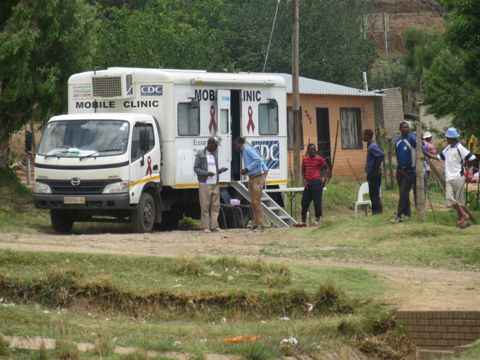 Mobile clinic as people get tested