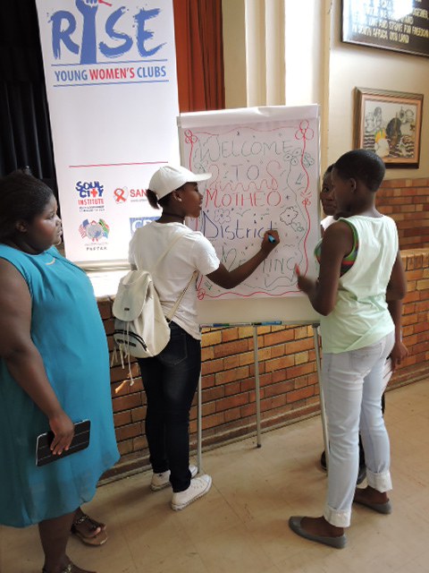 Members writing a welcome note