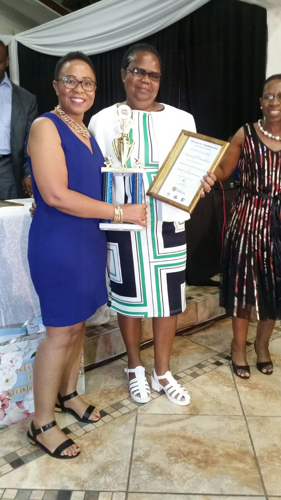 Senior Manager Pulane handing over awards