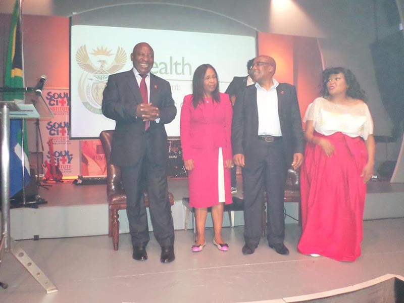 Lebo Ramafoko Soul City CEO on stage with Dep Pres and Minister of Health